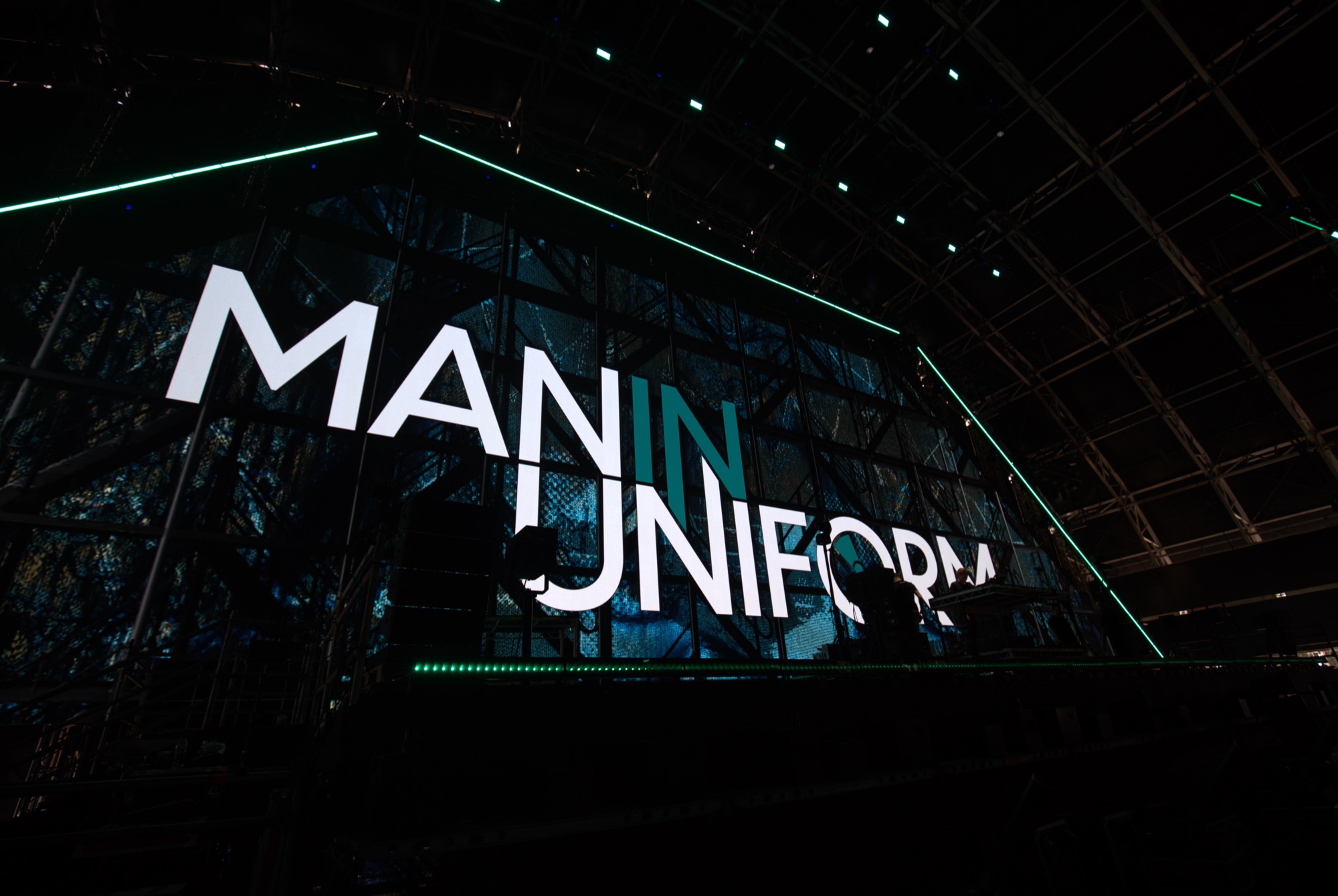 The ManInUniform name lit up across the SteelYard stage at Creamfields 2025.